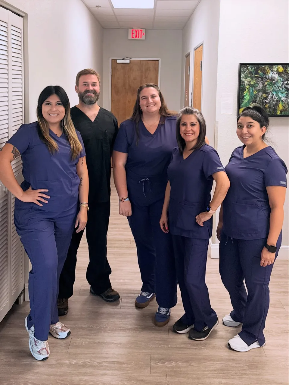 Provider and patient in an exam room at Texas Foot & Ankle Surgical Associates